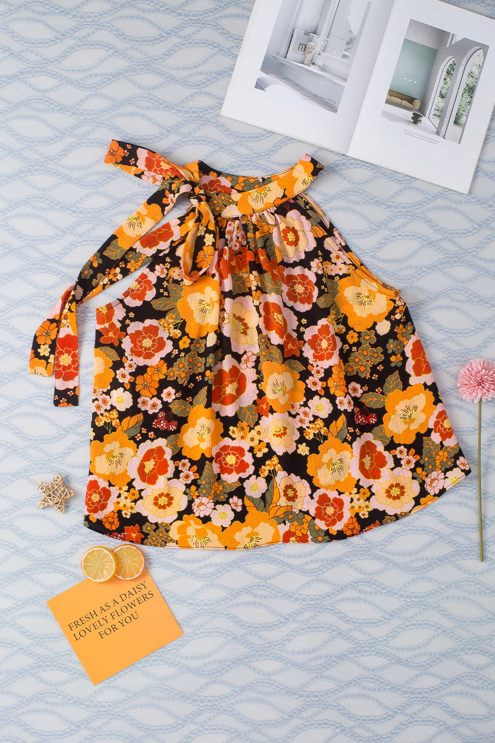 Haut sans manches noué à imprimé floral et col licou