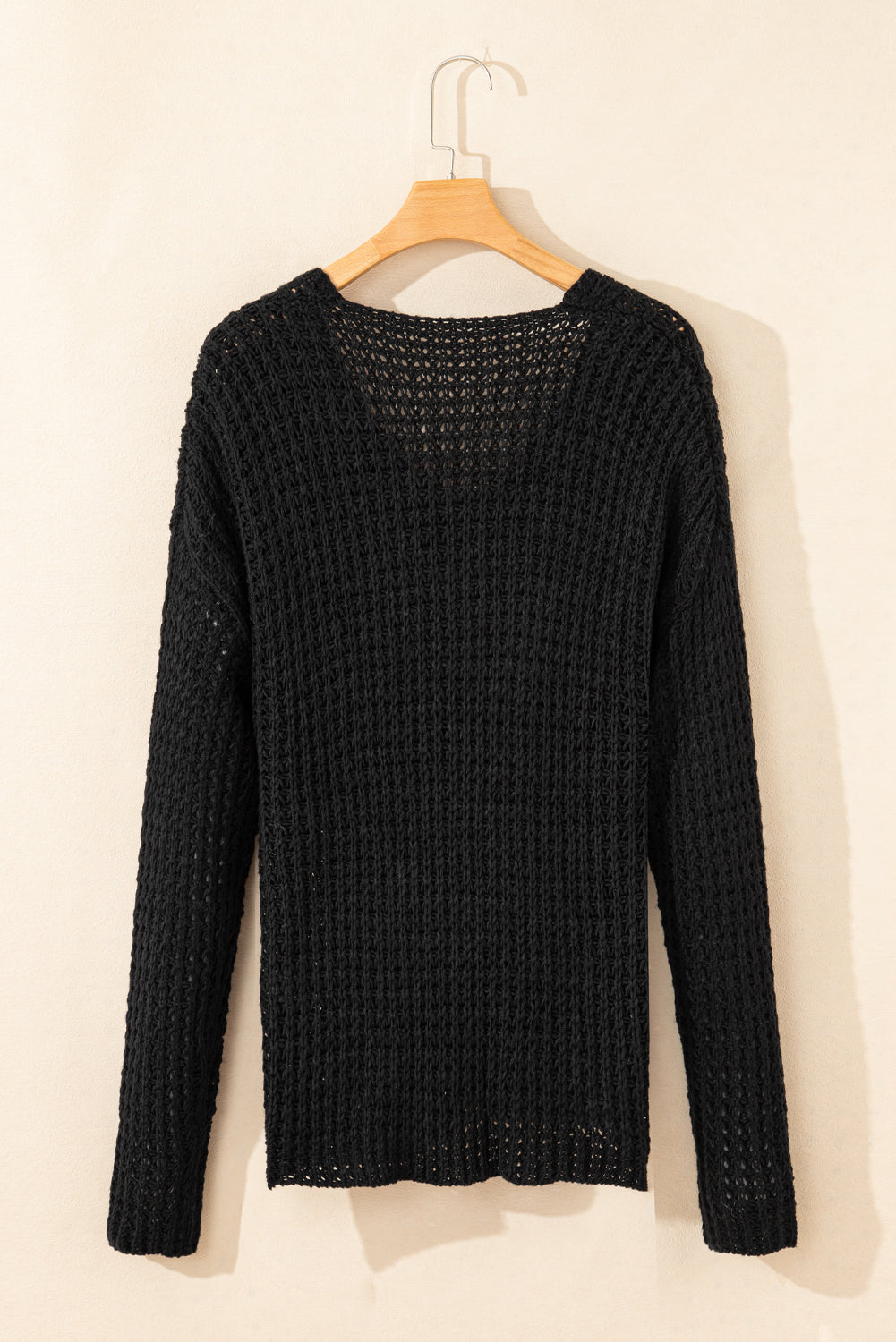 Pull à col en V au crochet évidé