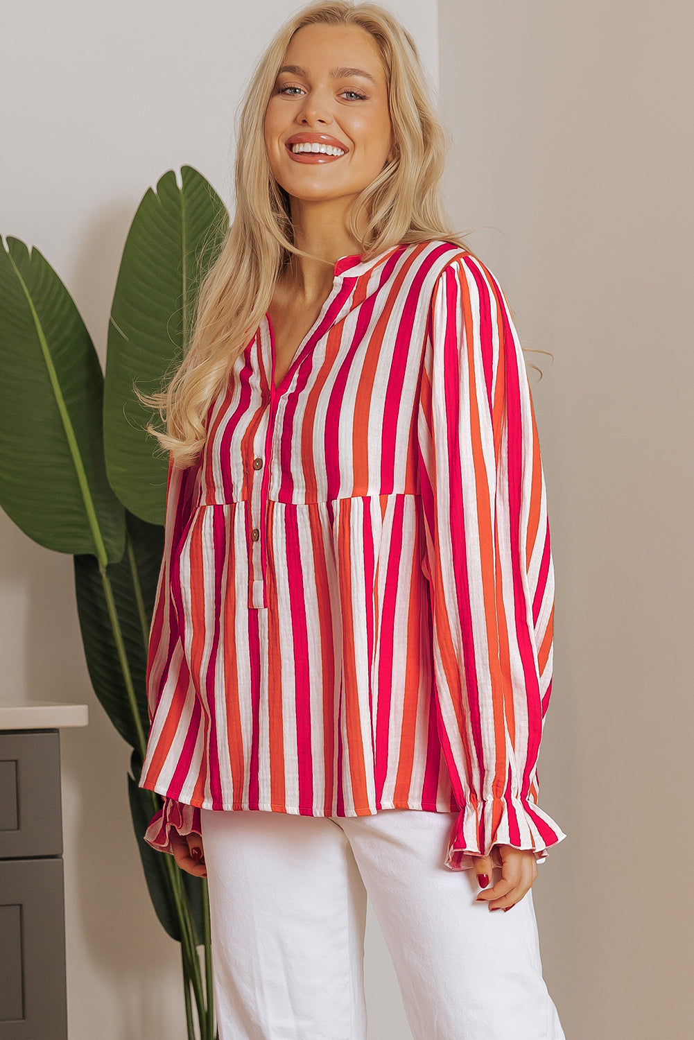 Blouse boutonnée sur le devant a col en V cranté et manches ballon