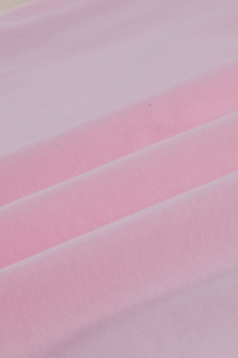 Haut rose à manches en maille à volants et paillettes