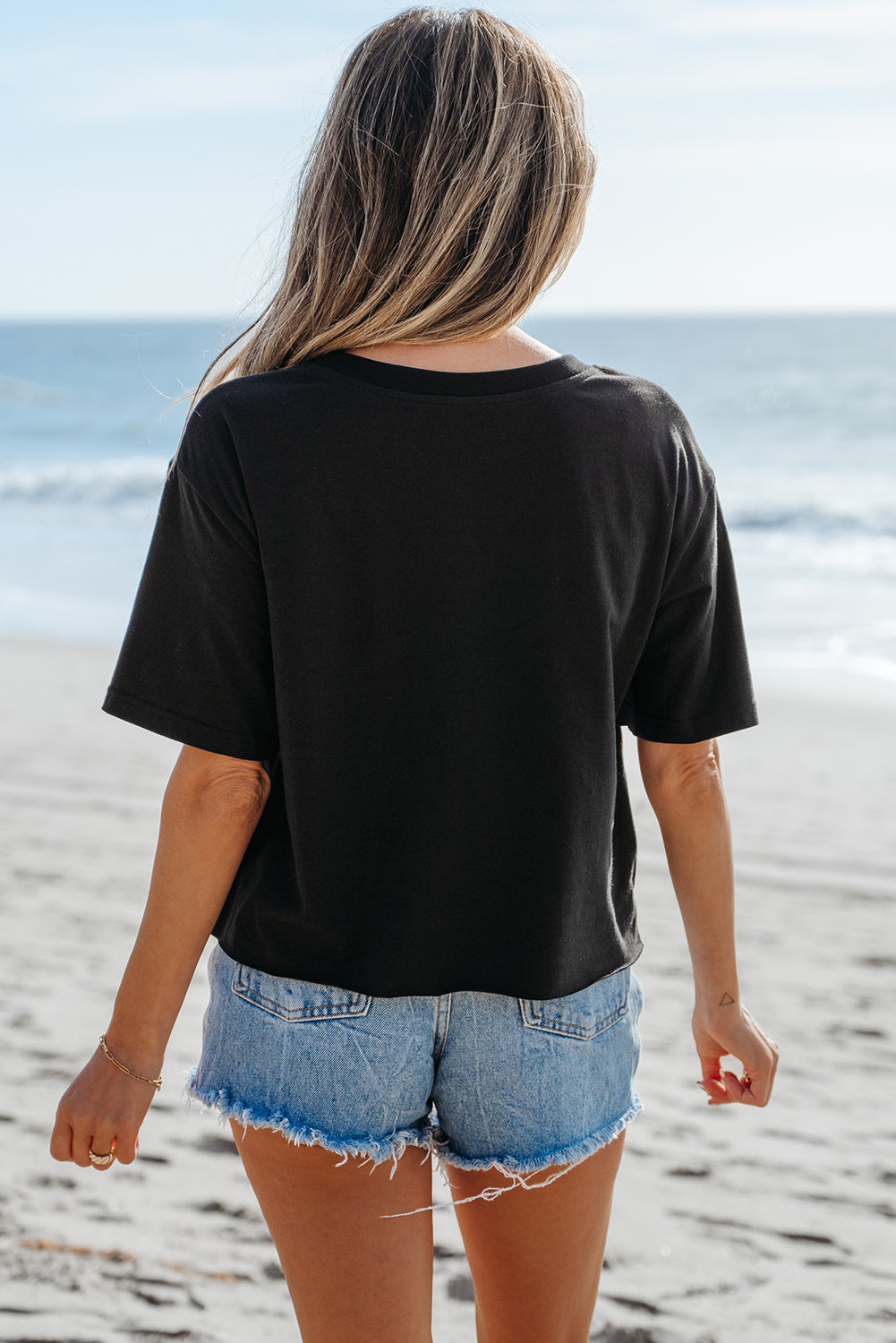 T-shirt col rond imprimé signe de paix en damier