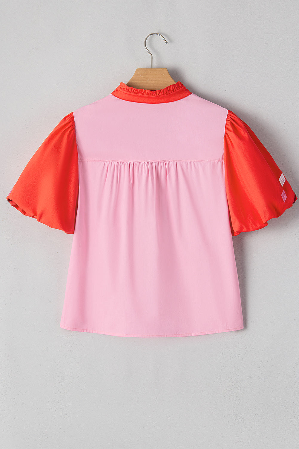 Chemisier babydoll à manches bouffantes et col en V brodé de fleurs