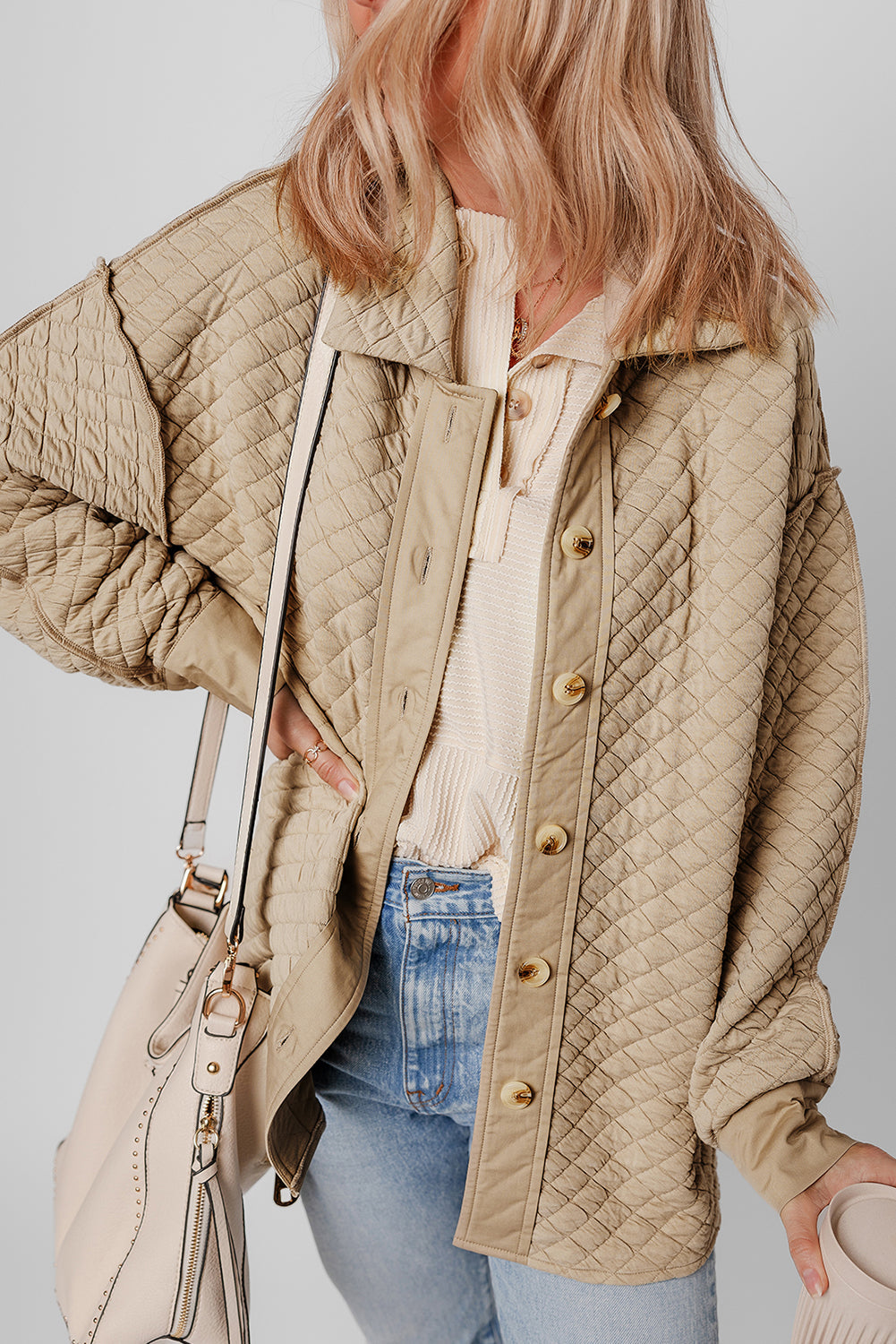 Veste matelassée boutonnée de couleur unie