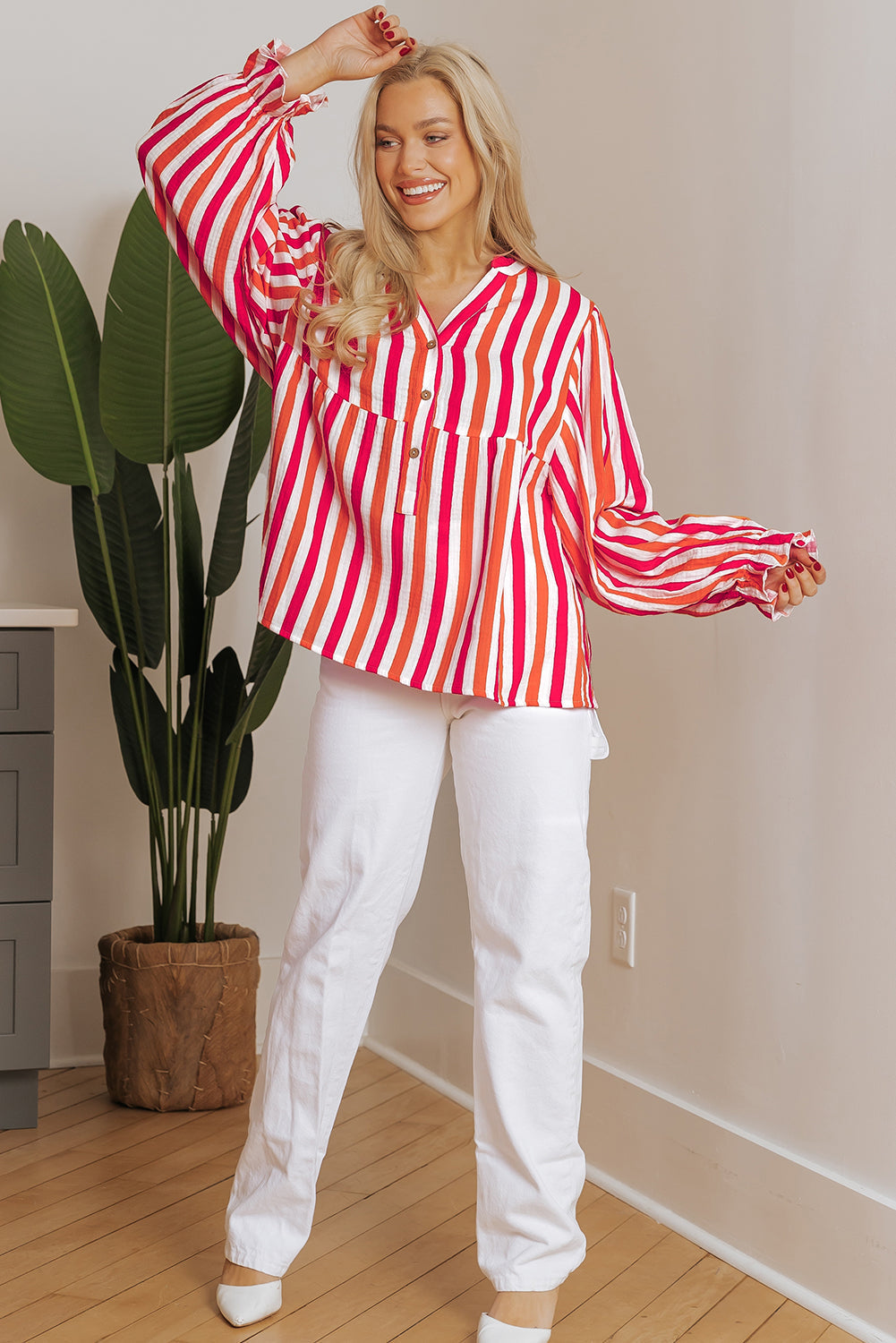 Blouse boutonnée sur le devant a col en V cranté et manches ballon
