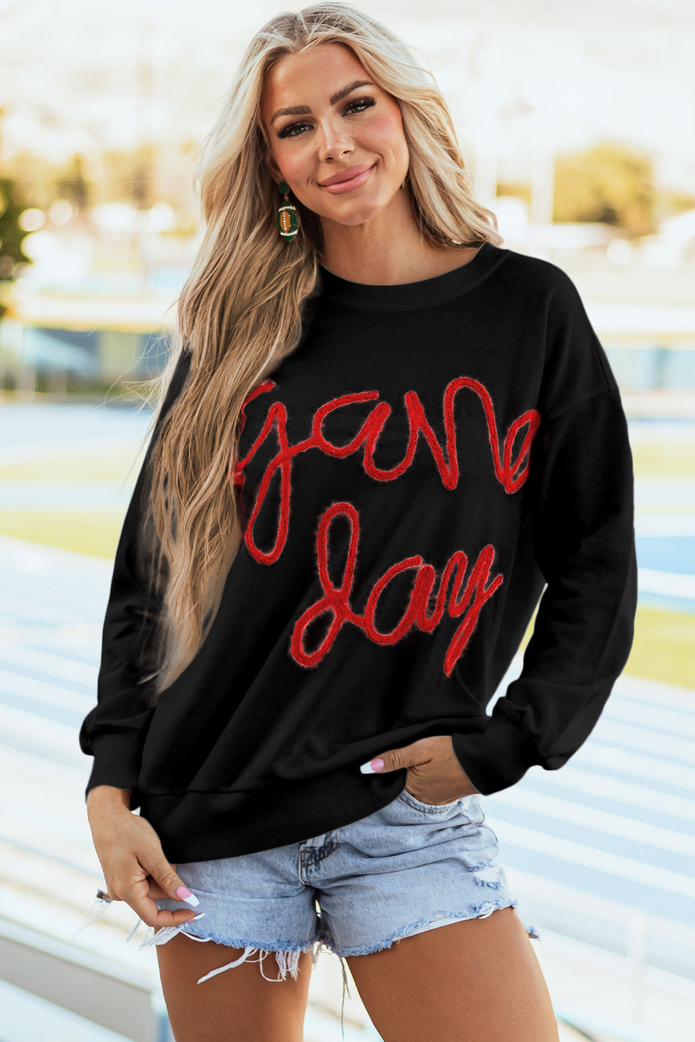 Tinsel Game Day - Sweat-shirt graphique a épaules tombantes