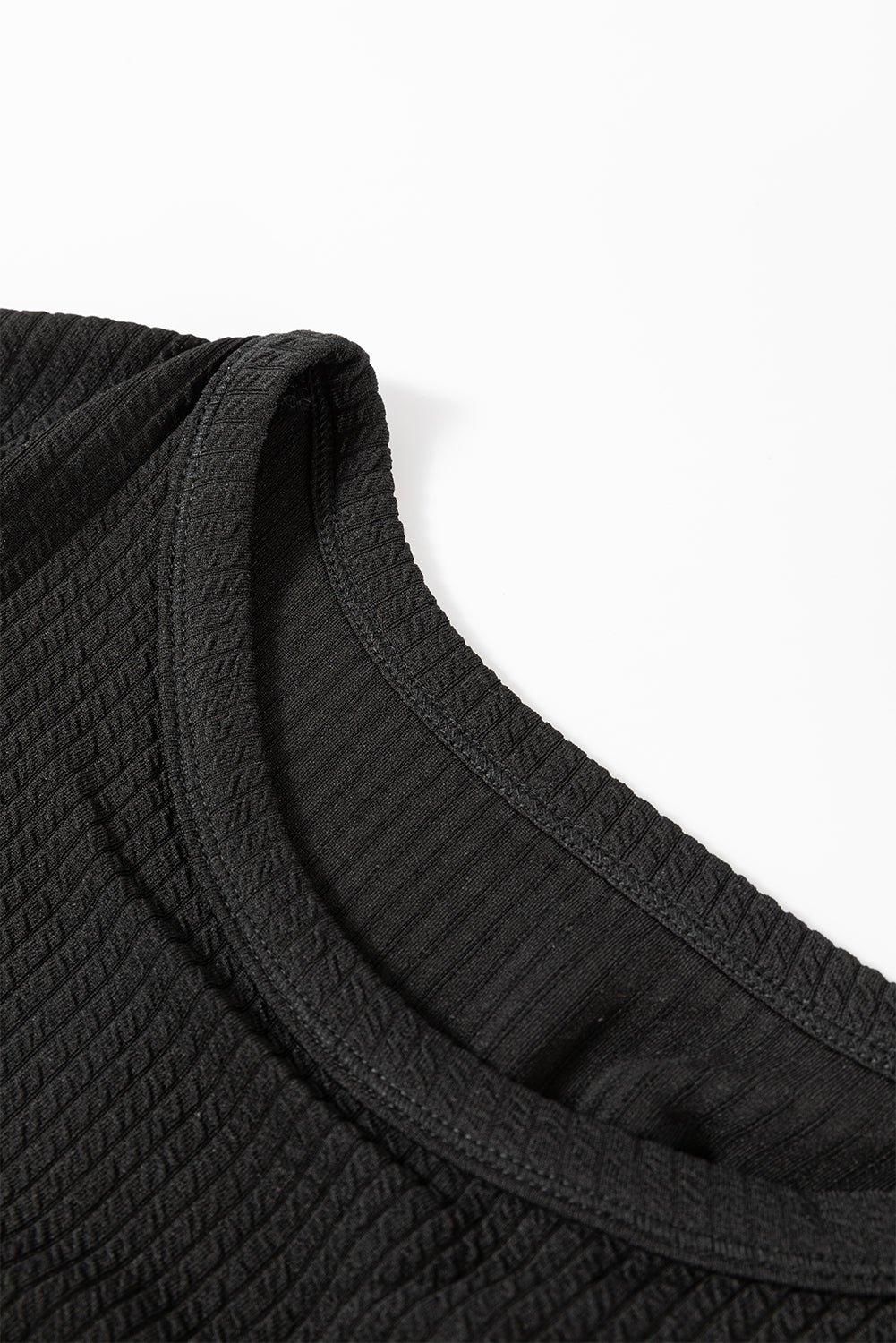 Haut a manches longues et épaules tombantes en cordon de couleur unie