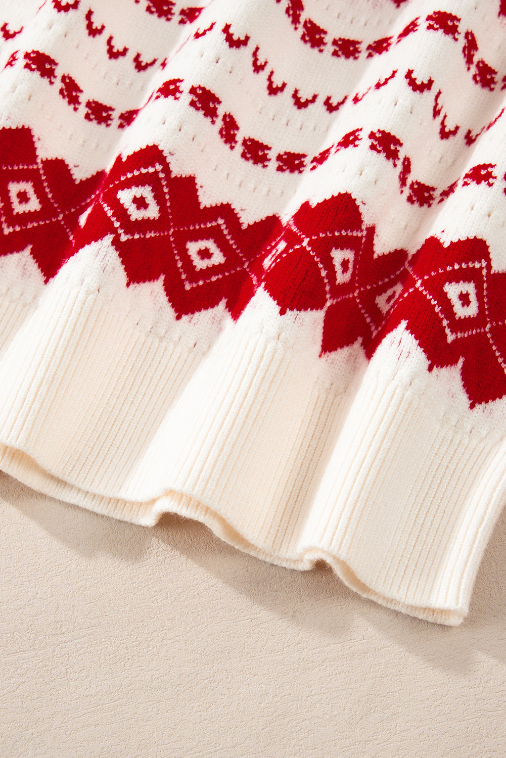 Pull ample a col rond a motifs géométriques occidentaux