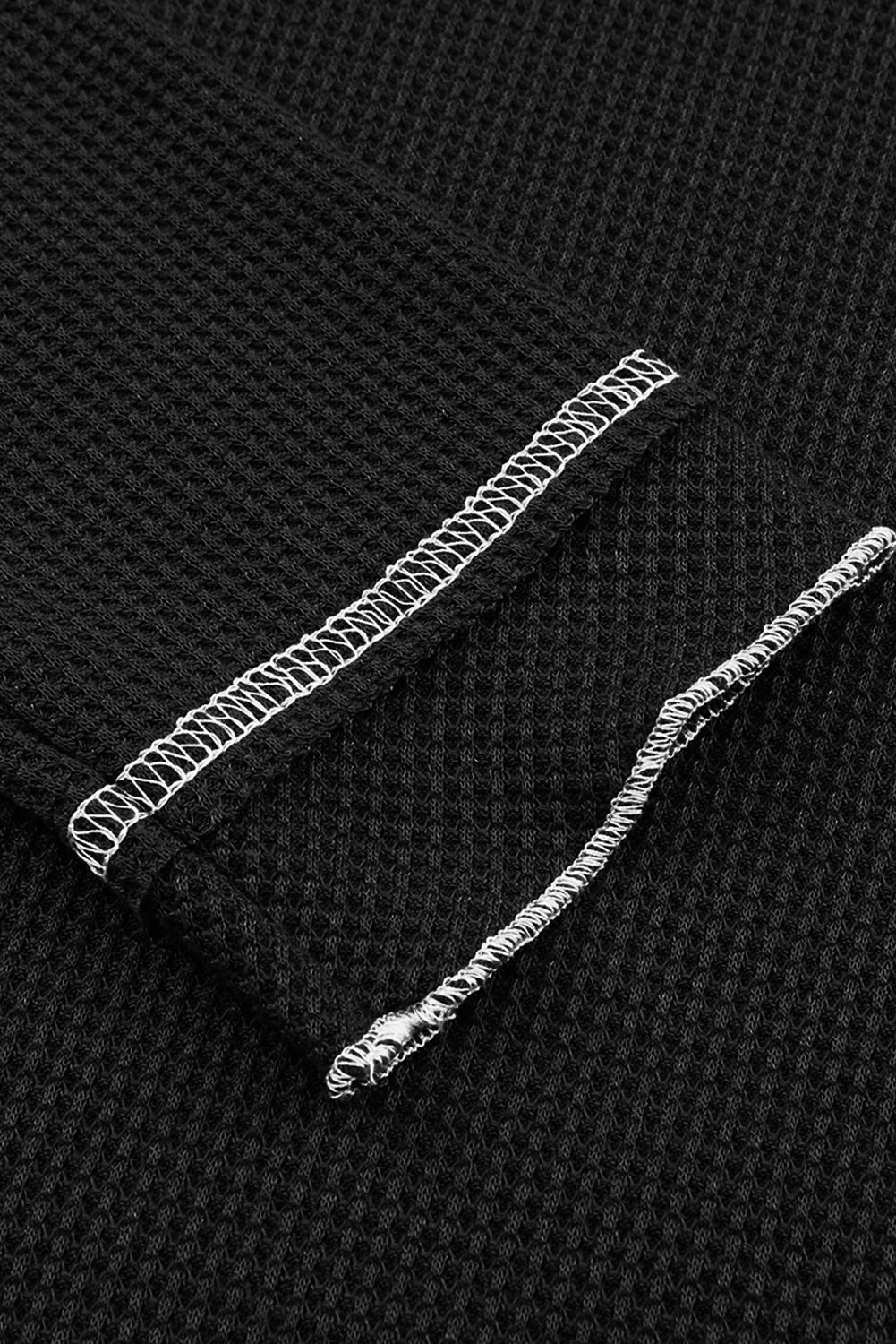 Haut texturé a manches longues et col rond