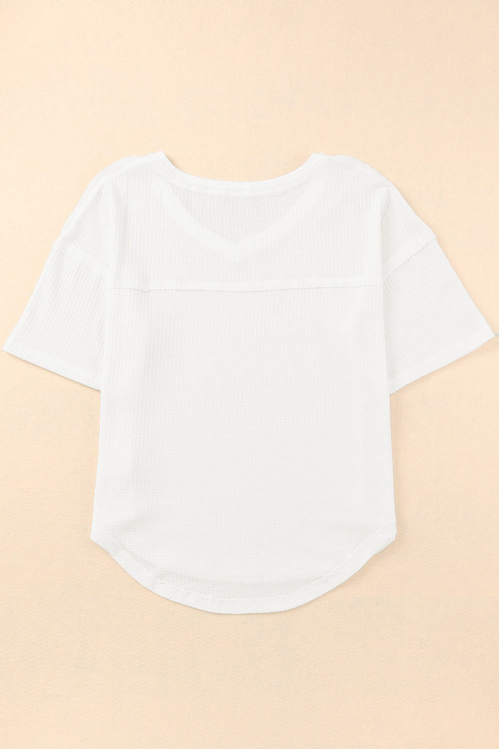 Haut ample en tricot gaufré blanc à épaules tombantes