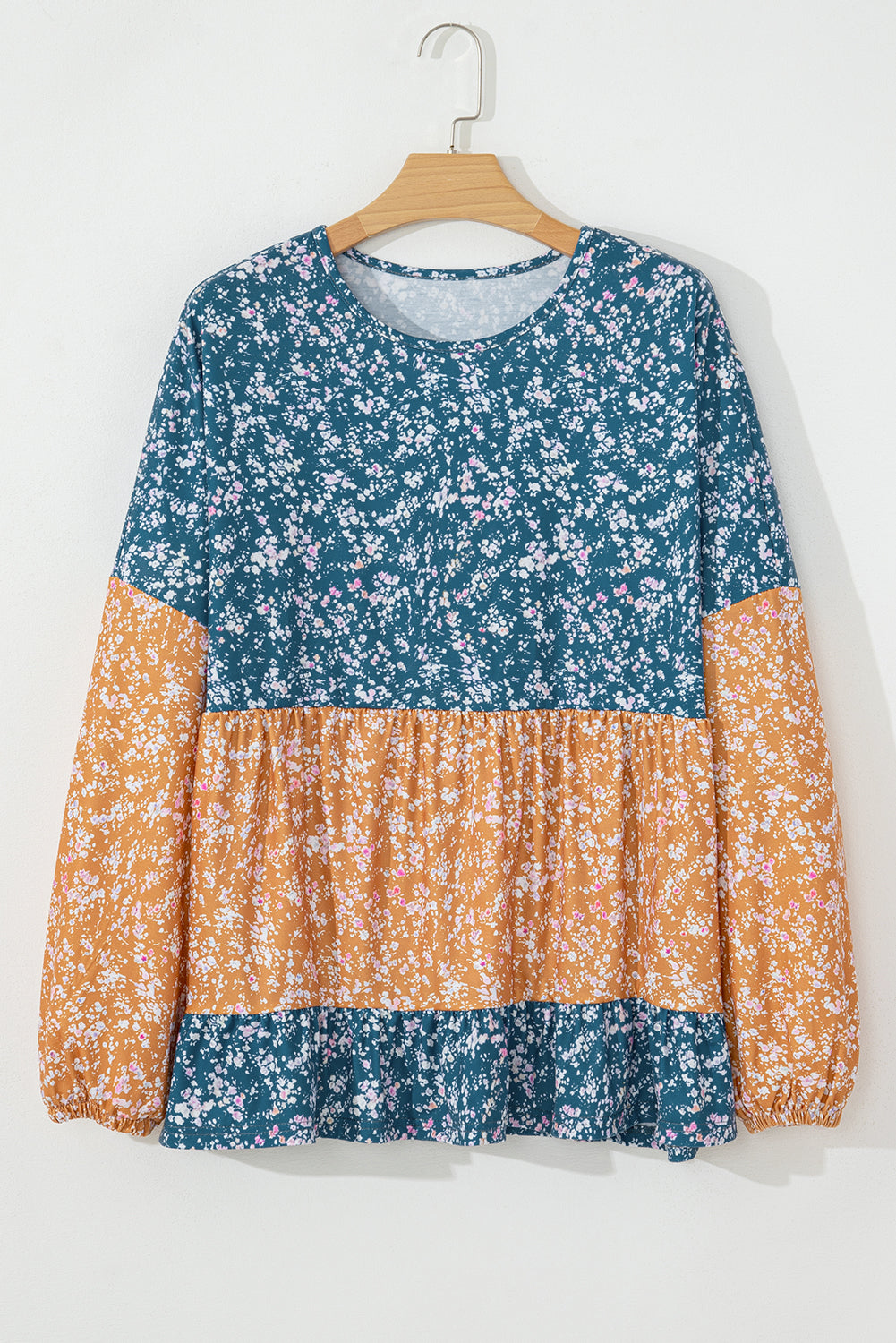 Blouse florale a col rond et ourlet a volants en patchwork de blocs de couleurs