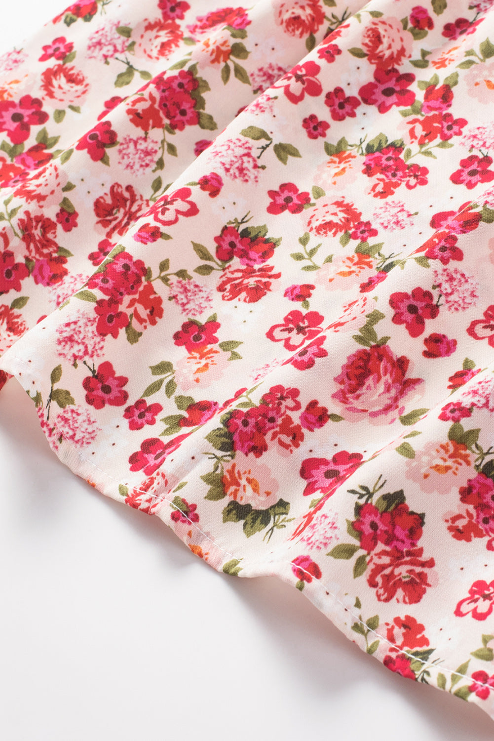 Haut sans manches à col montant et imprimé floral