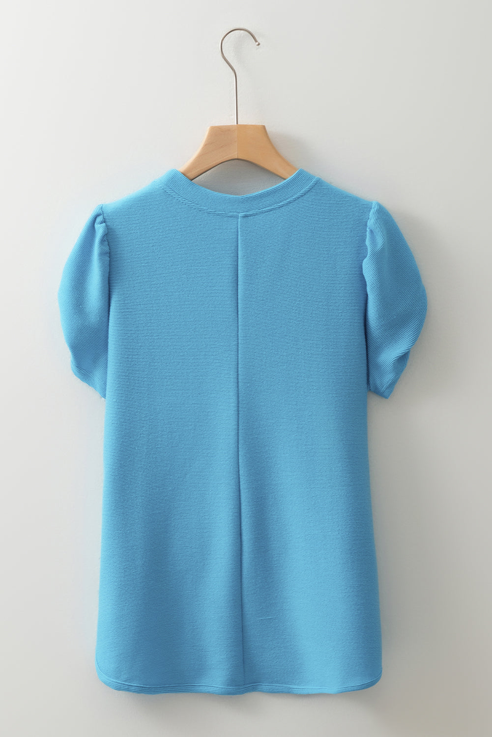 T-shirt élégant à manches bouffantes de couleur unie