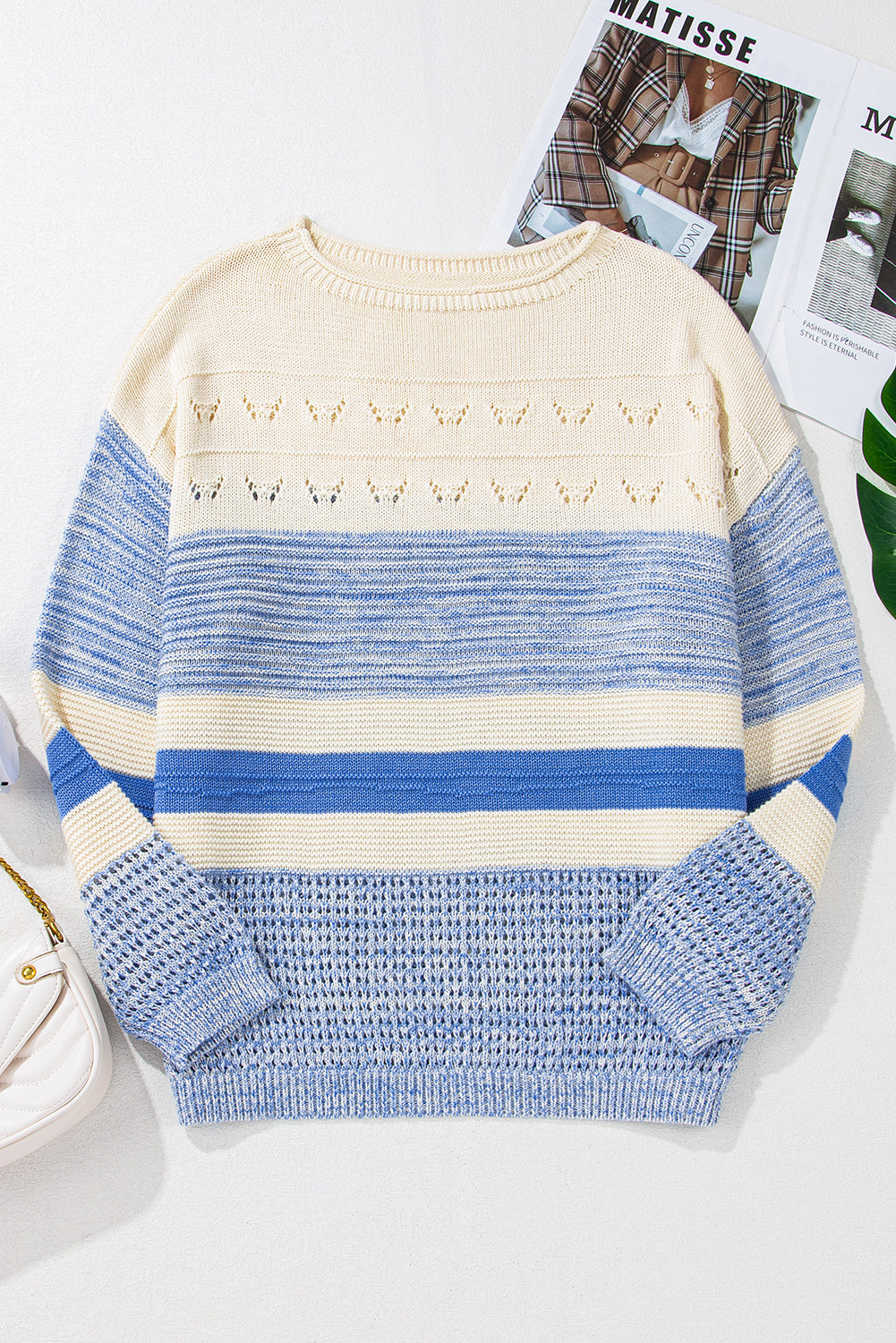 Pull a manches bouffantes et point ouvert