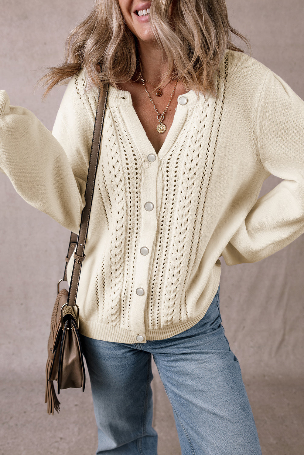 Cardigan pull boutonné a manches plissées et détails creux