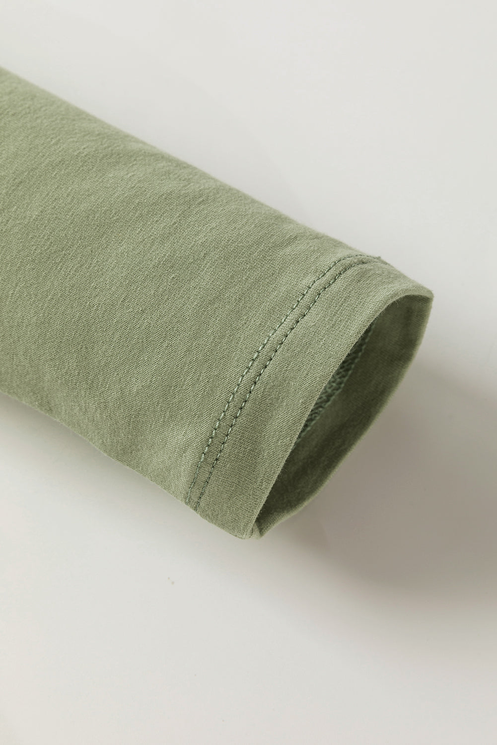 Haut ajusté a manches longues et col en V avec boutons