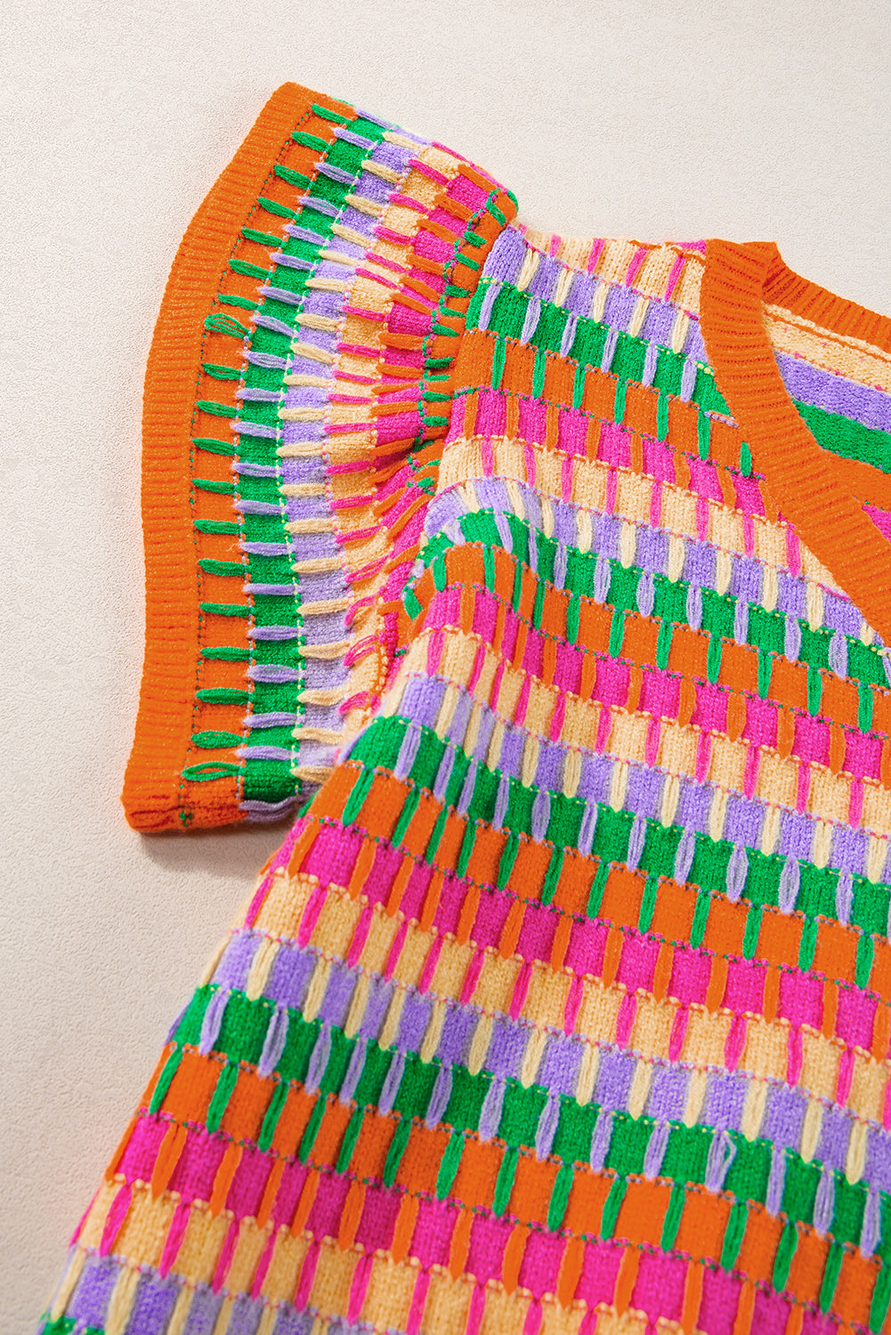 Haut pull tricoté a manches flottantes multiples