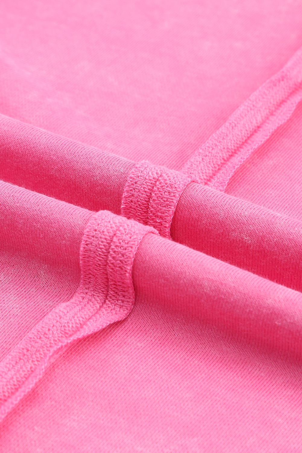 Sweat-shirt à bords bruts, coutures apparentes, haut et bas