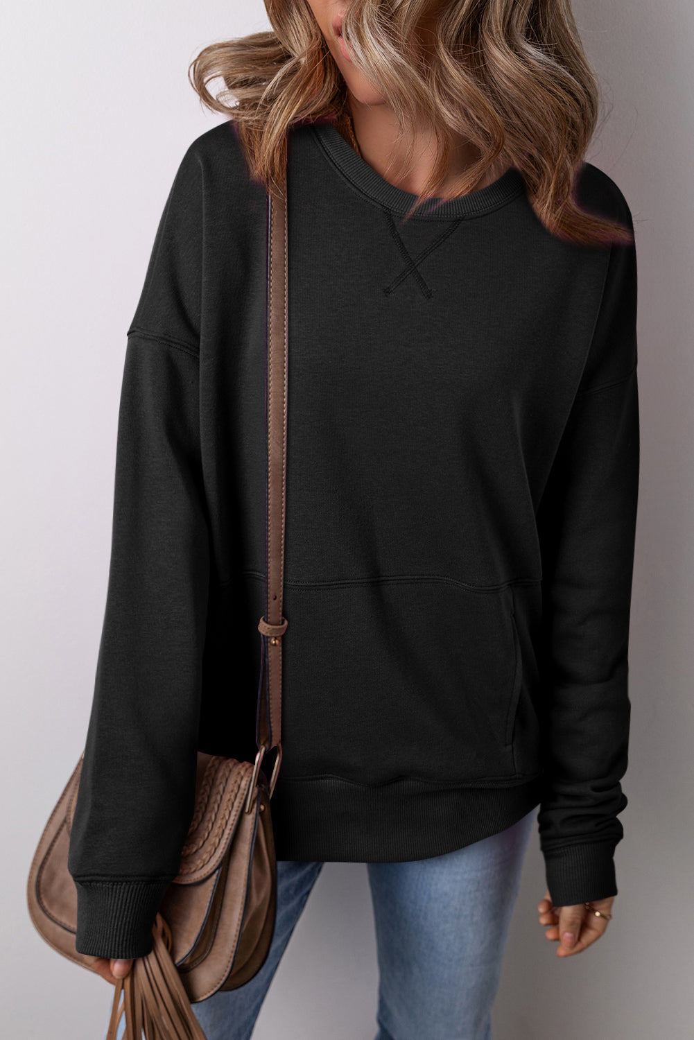 Sweat-shirt ample avec poches et coutures croisées a épaules tombantes