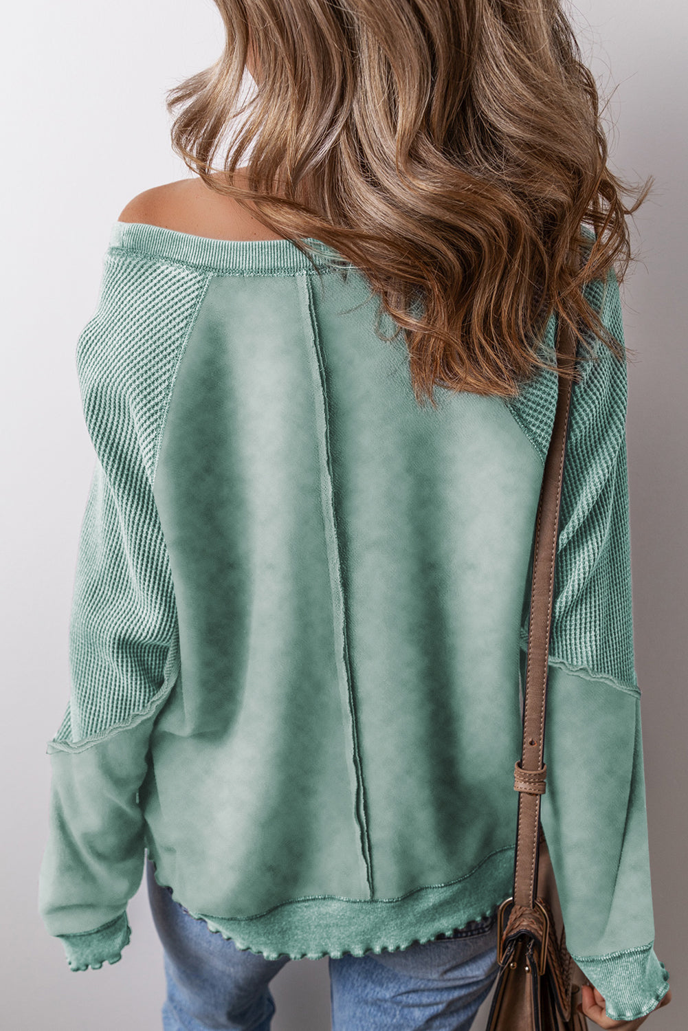 Sweat-shirt a manches raglan en tricot gaufré uni