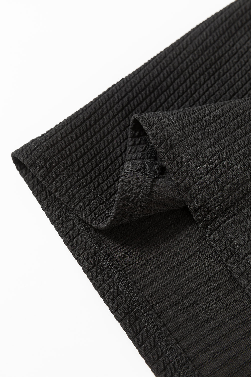 Haut a manches longues et épaules tombantes en cordon de couleur unie