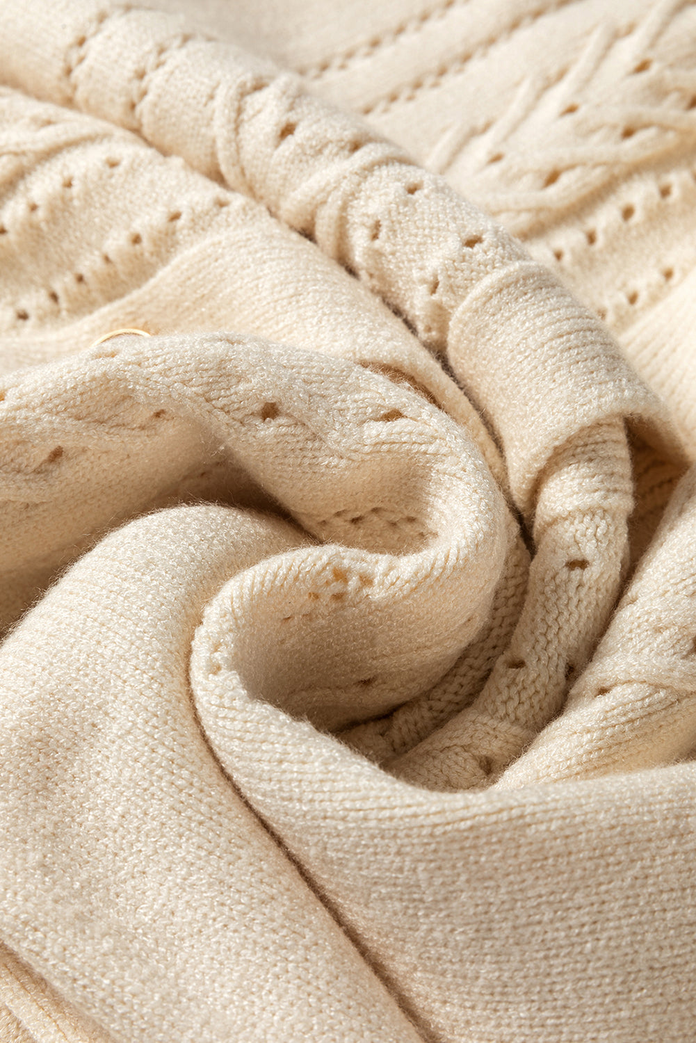 Cardigan pull boutonné a manches plissées et détails creux