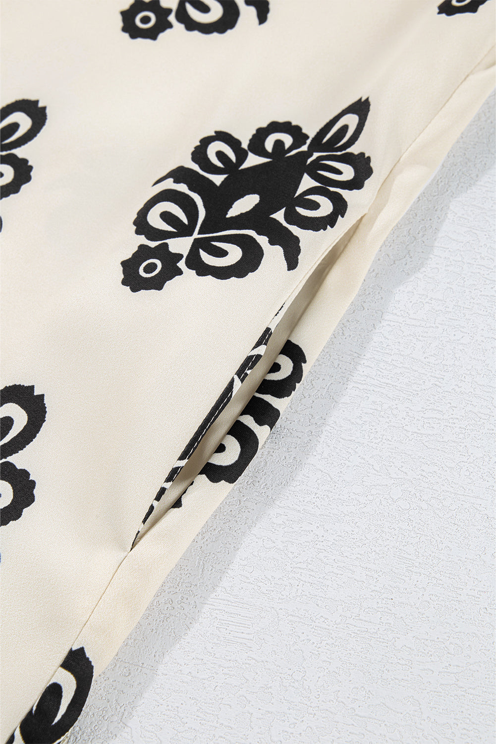 Mini-robe sans manches à imprimé géométrique avec nœud papillon dans le dos
