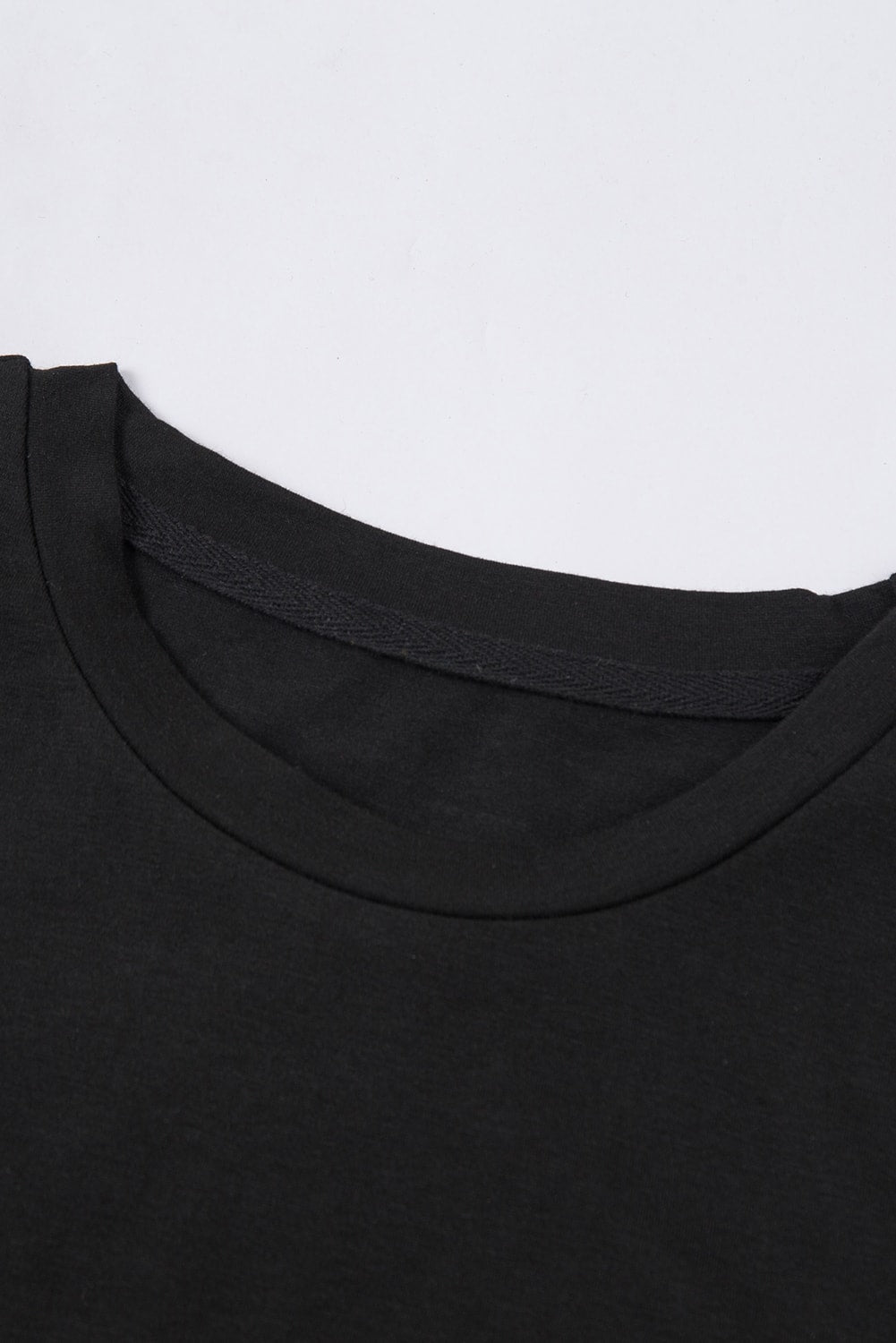 T-shirt noir à col rond de couleur unie