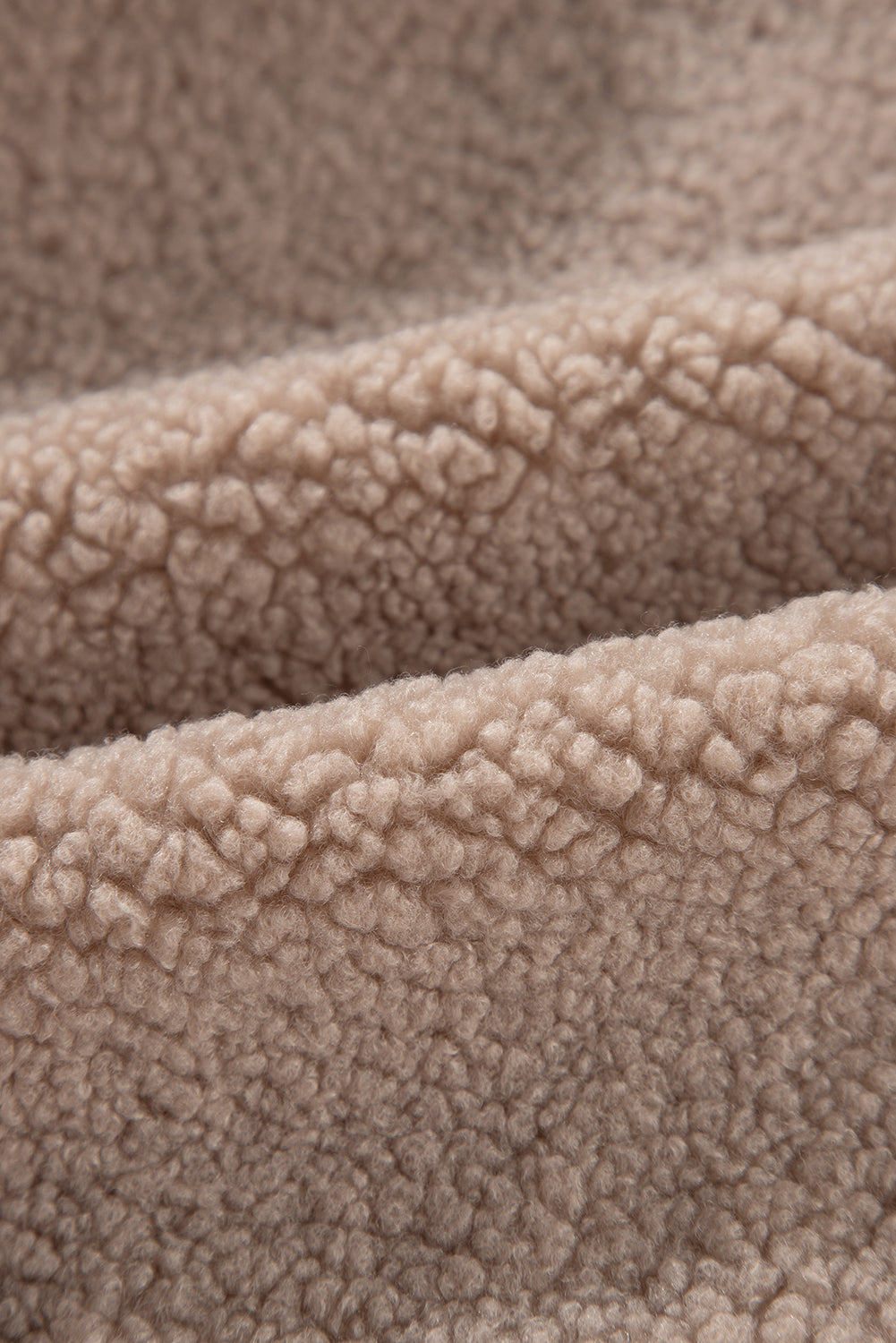 Veste pelucheuse d'hiver avec poches zippées