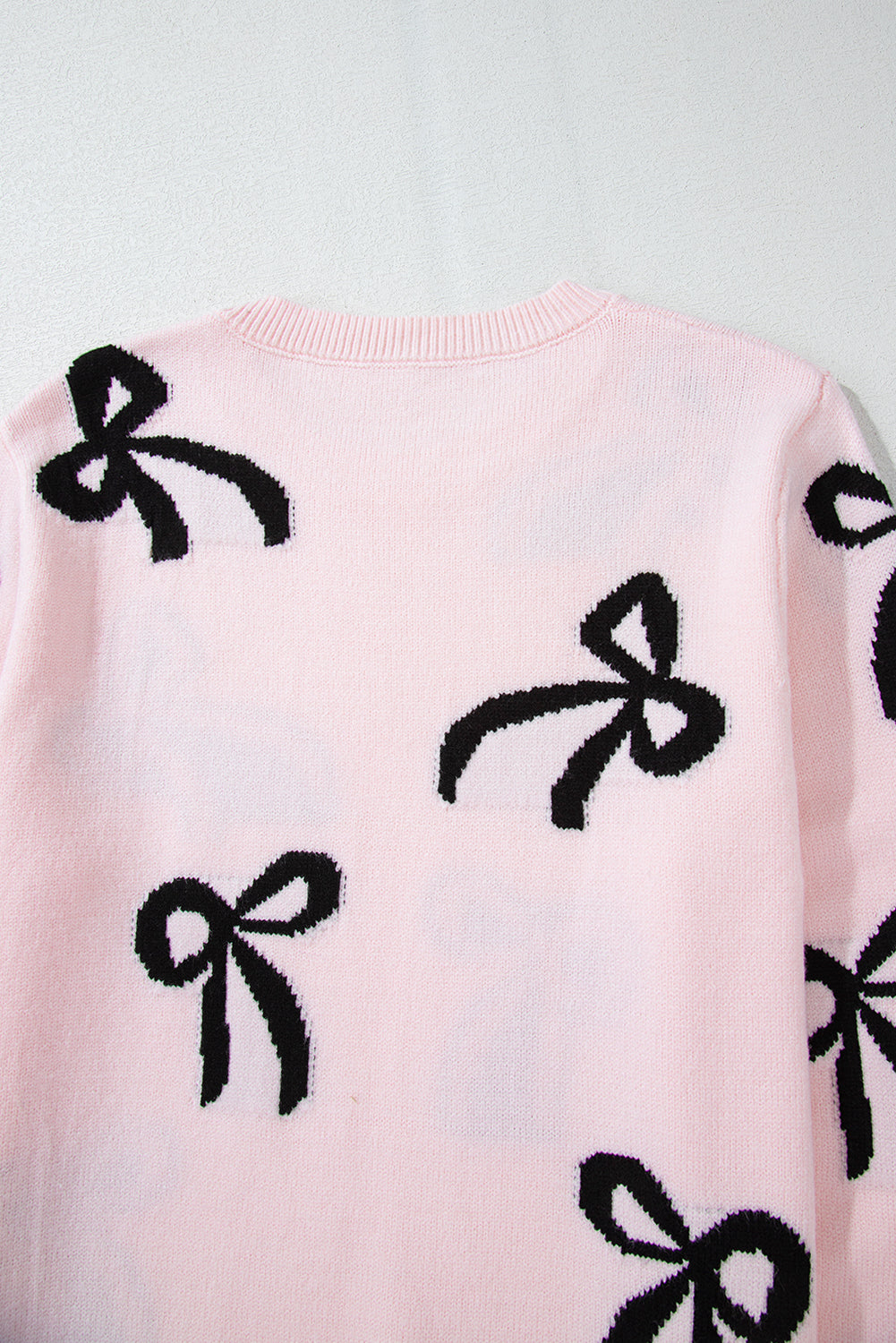 Pull ample en tricot à motif nœud