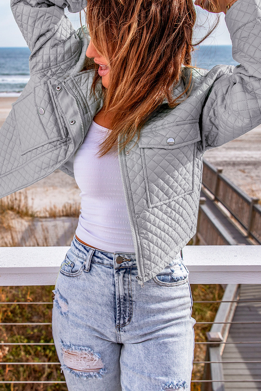 Veste courte matelassée zippée avec poches