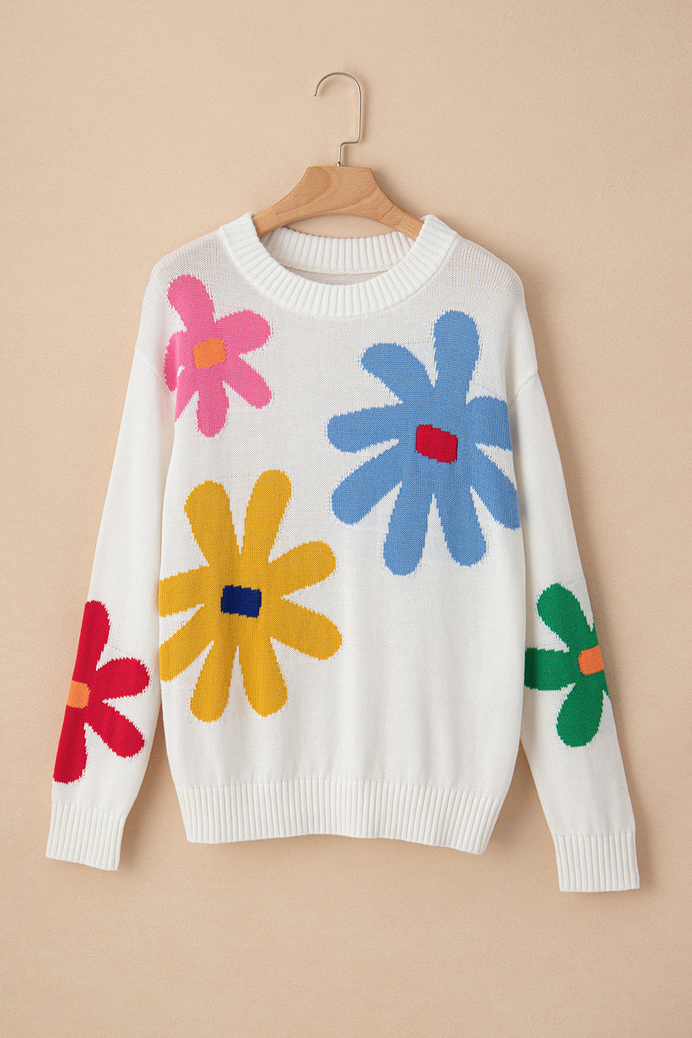 Pull a col rond a motif de grandes fleurs colorées