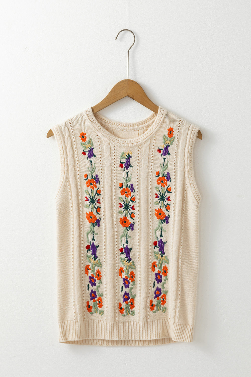 Gilet pull en tricot torsadé floral brodé