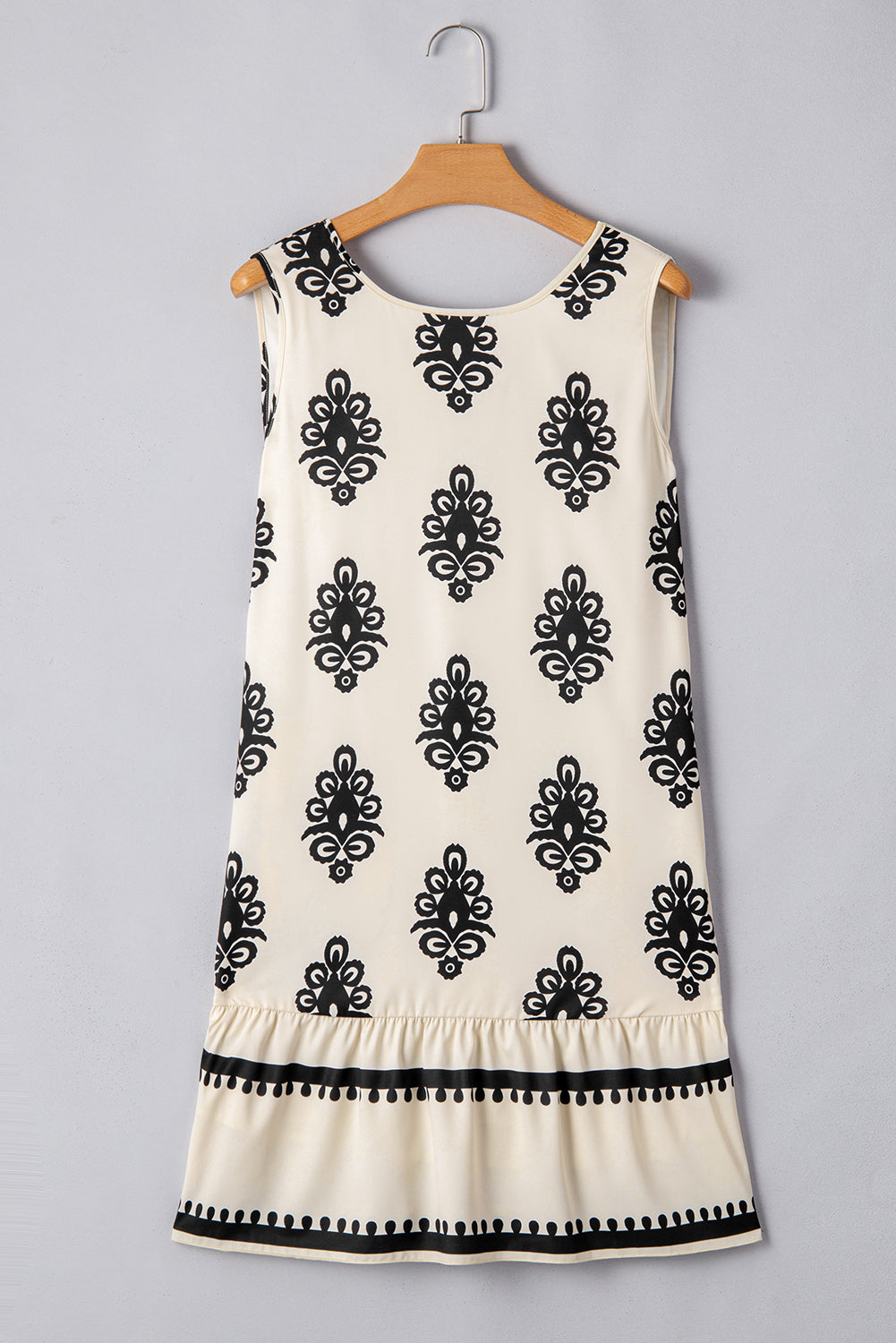 Mini-robe sans manches à imprimé géométrique avec nœud papillon dans le dos