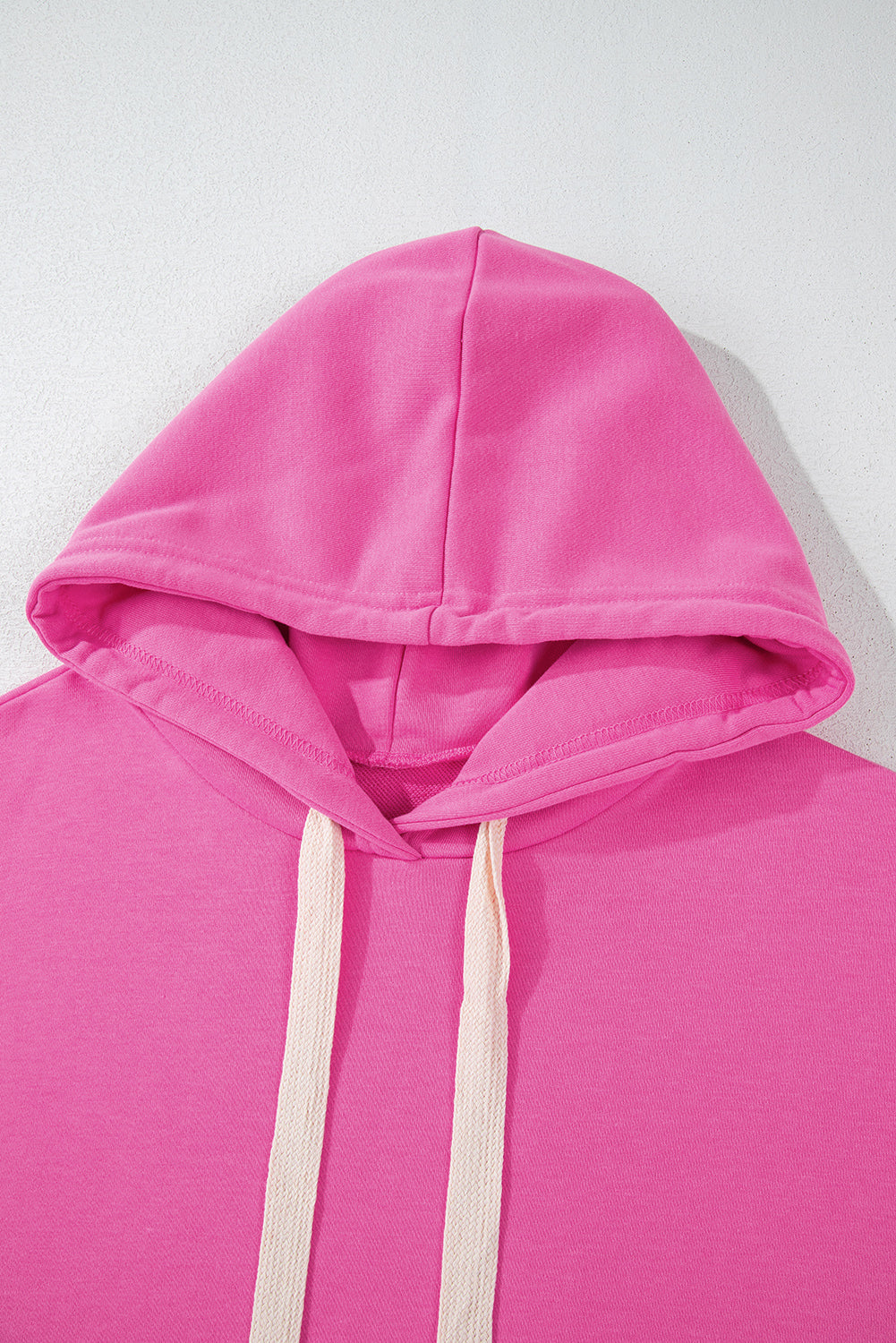 Sweat a capuche court uni a épaules tombantes et cordon de serrage