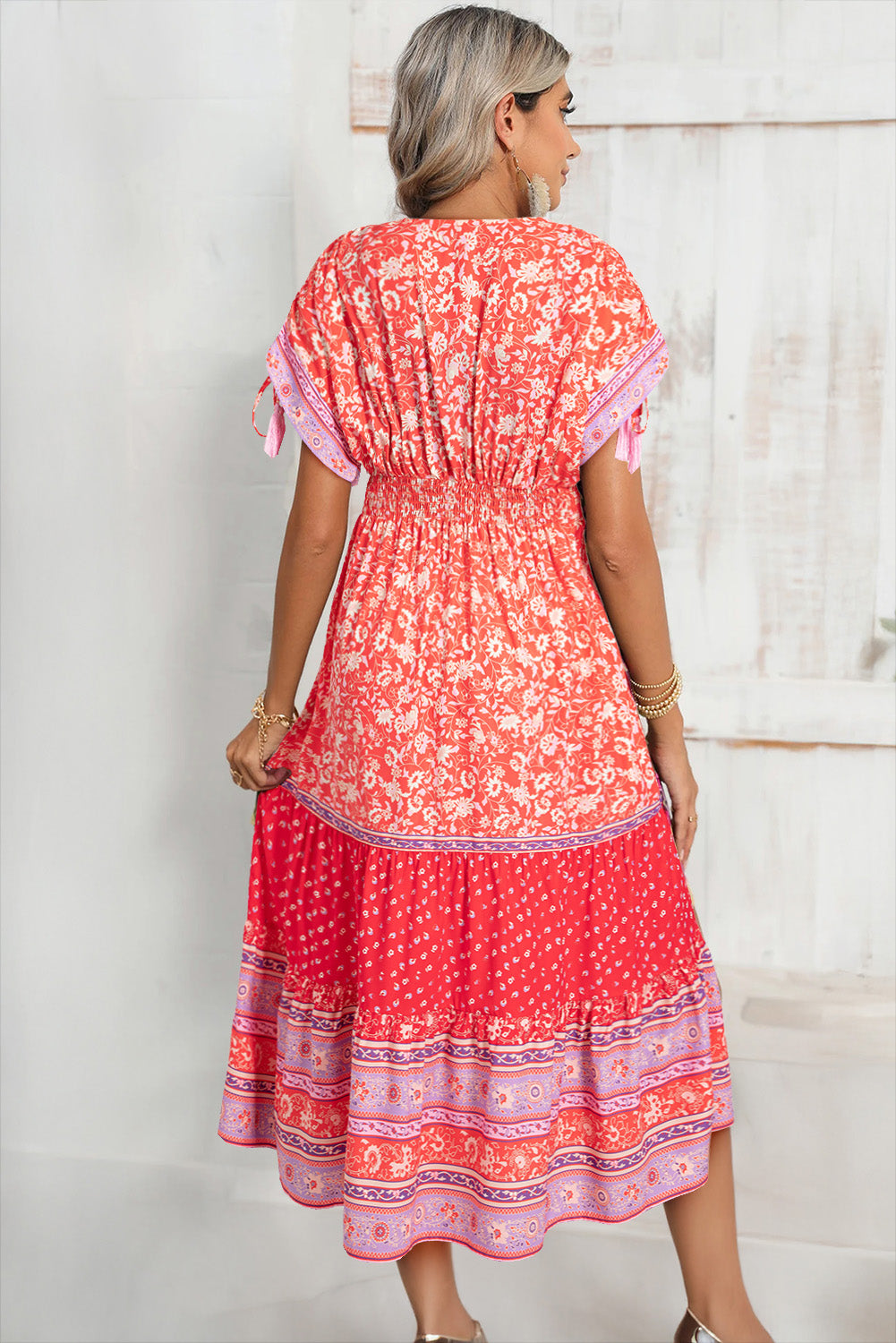 Robe longue taille empire à imprimé floral et manches nouées à pompons