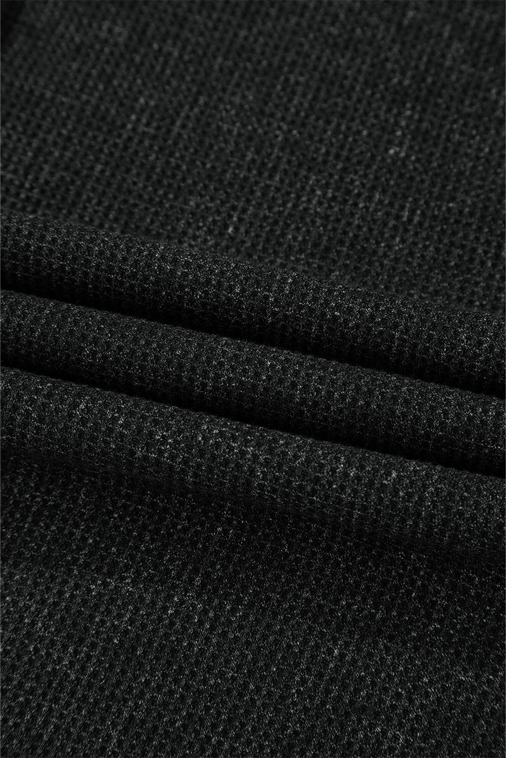 Haut a manches longues et encolure boutonnée en tricot gaufré délavé a l'acide