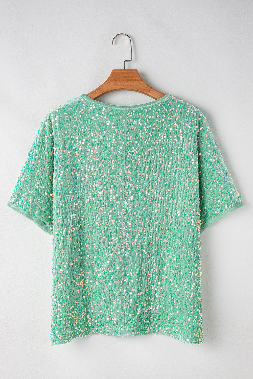 Blouse en velours a manches chauve-souris et paillettes