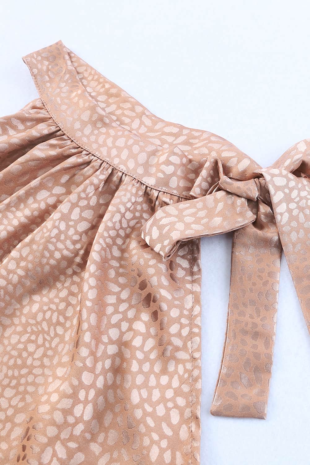 Débardeur léopard sans manches à col montant et lien