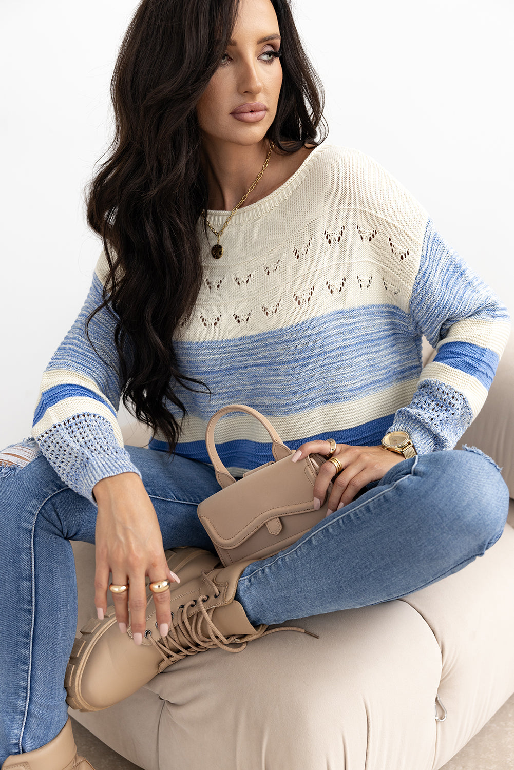 Pull a manches bouffantes et point ouvert