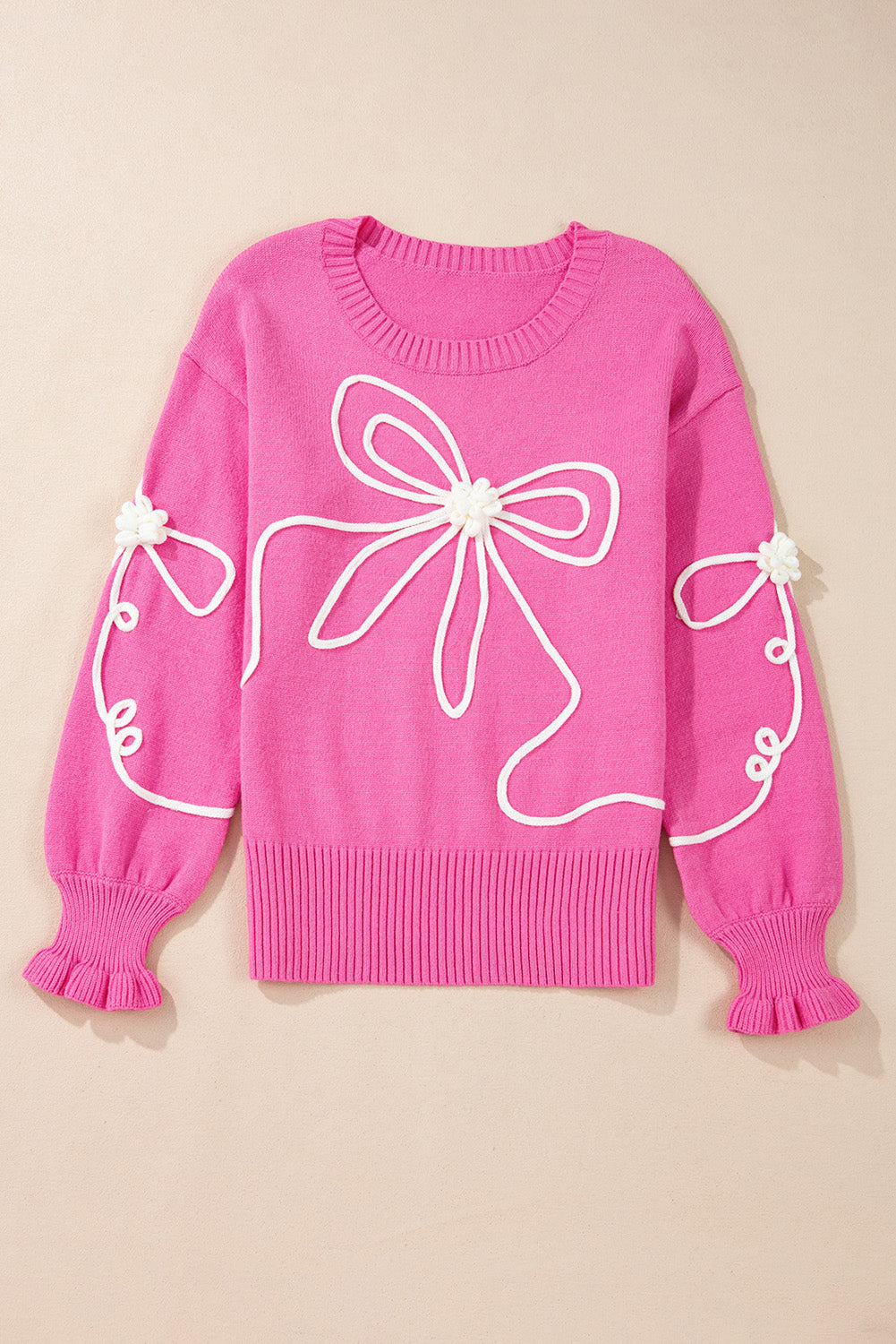 Pull décontracté à bordure côtelée et nœud fleuri