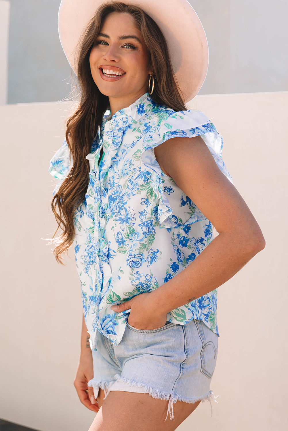 Chemise boutonnée à volants et manches à imprimé floral