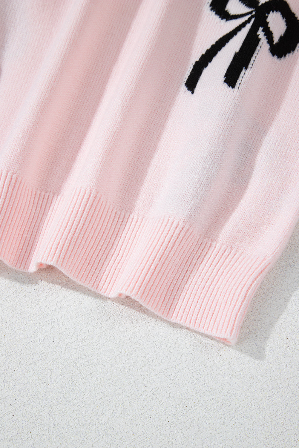Pull ample en tricot à motif nœud
