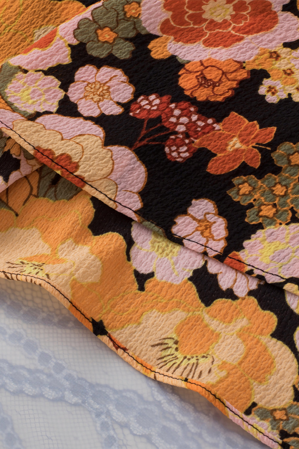 Haut sans manches noué à imprimé floral et col licou