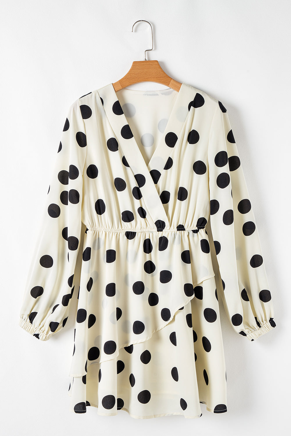 Mini-robe à pois, col en V, manches bouffantes et surplis