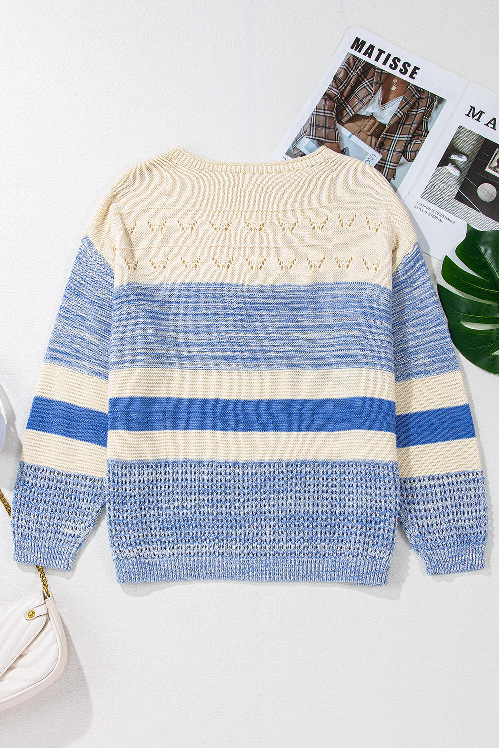 Pull a manches bouffantes et point ouvert