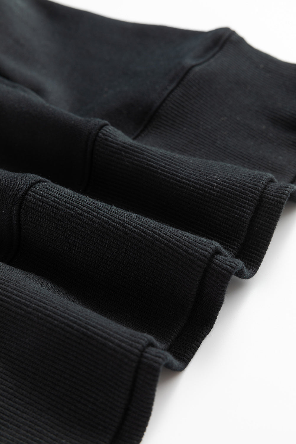 Sweat-shirt ample avec poches et coutures croisées a épaules tombantes