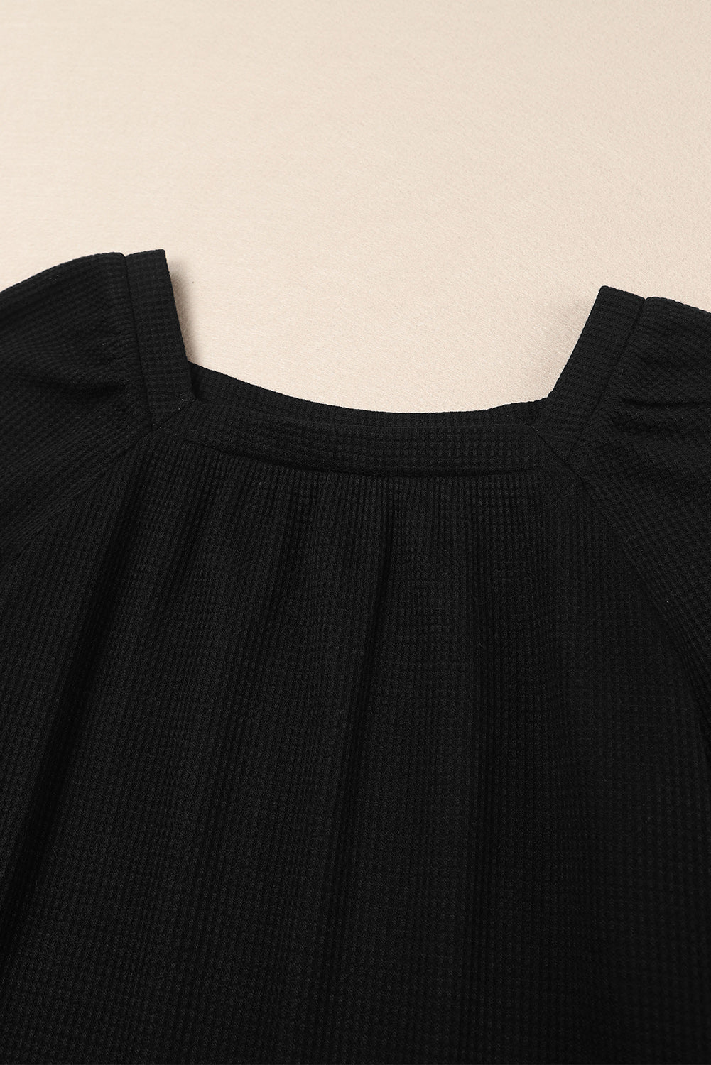 Haut en tricot gaufré à manches bouffantes et col rond