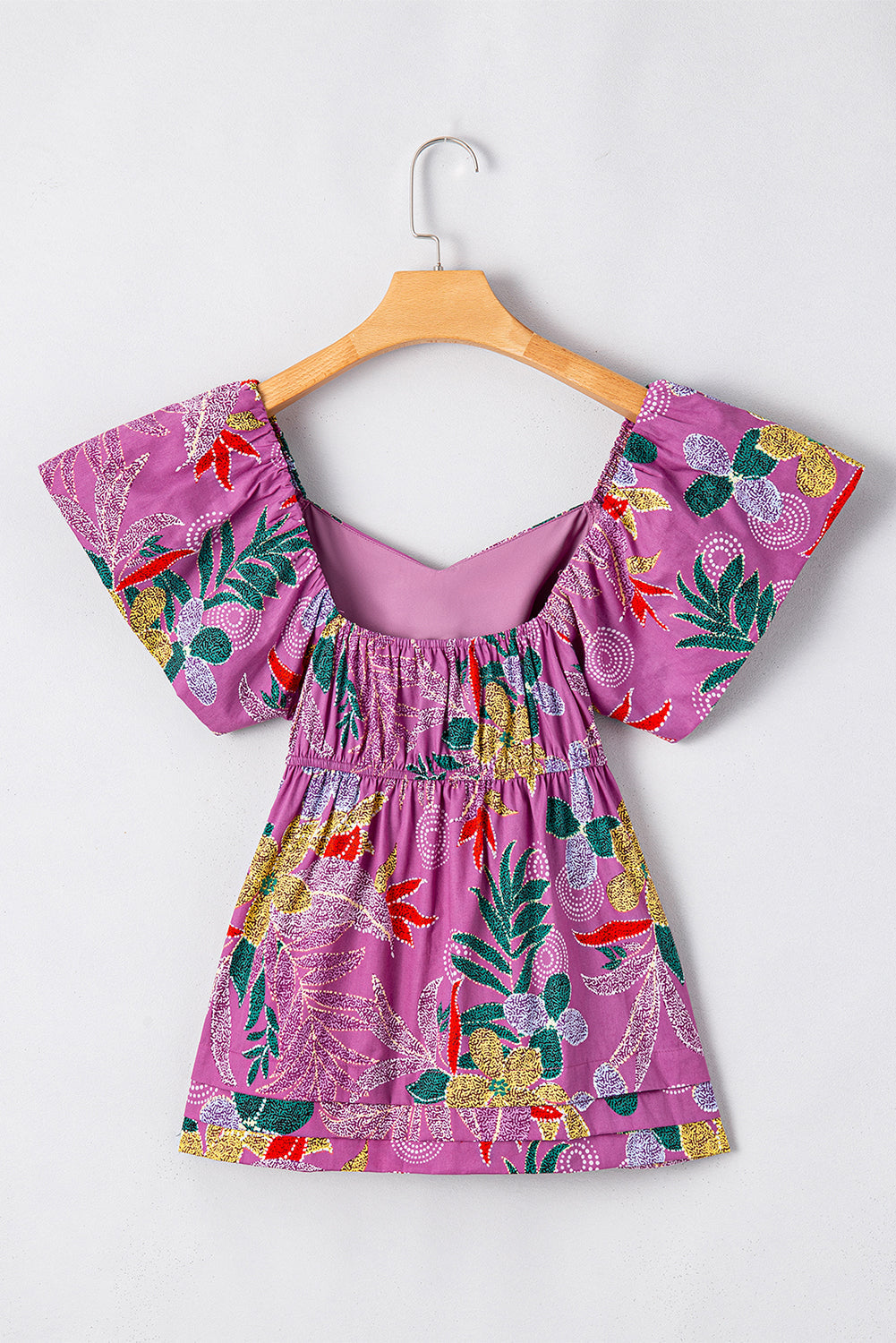 Chemisier à imprimé floral, col en cœur et manches flottantes
