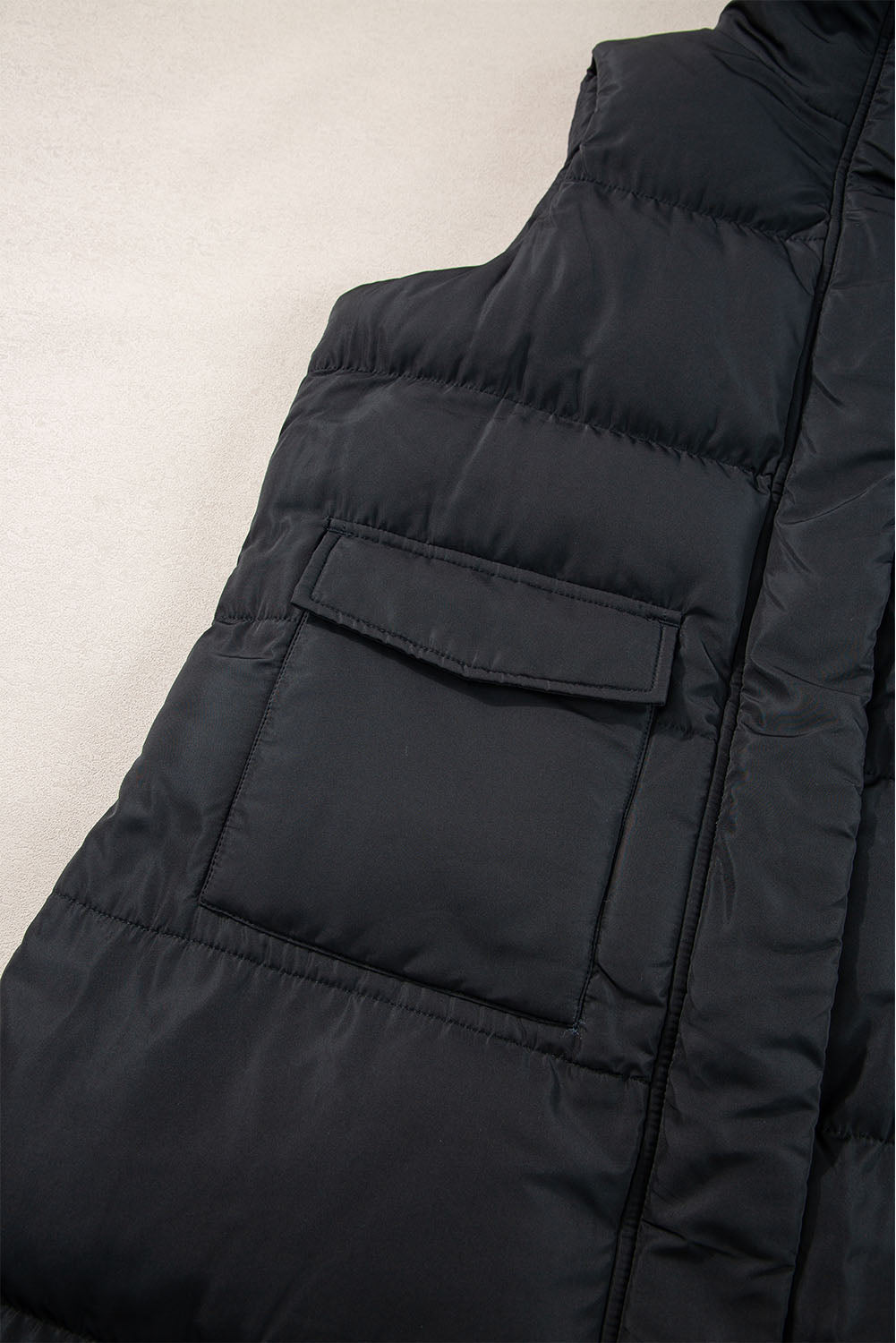 Gilet long coupe-vent a fermeture éclair et poches