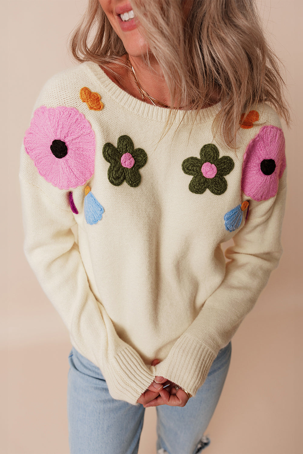 Pull tricoté à bords côtelés à motif floral